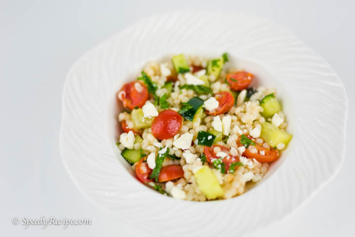 Couscous with Tomato Cucumber Feta and Mint Salad