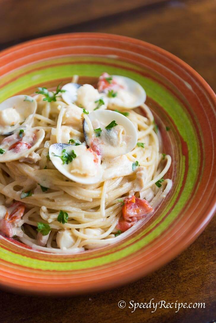 Clam and Scallops Spaghetti Pasta with Tomato in Creamy Wine Sauce Recipe